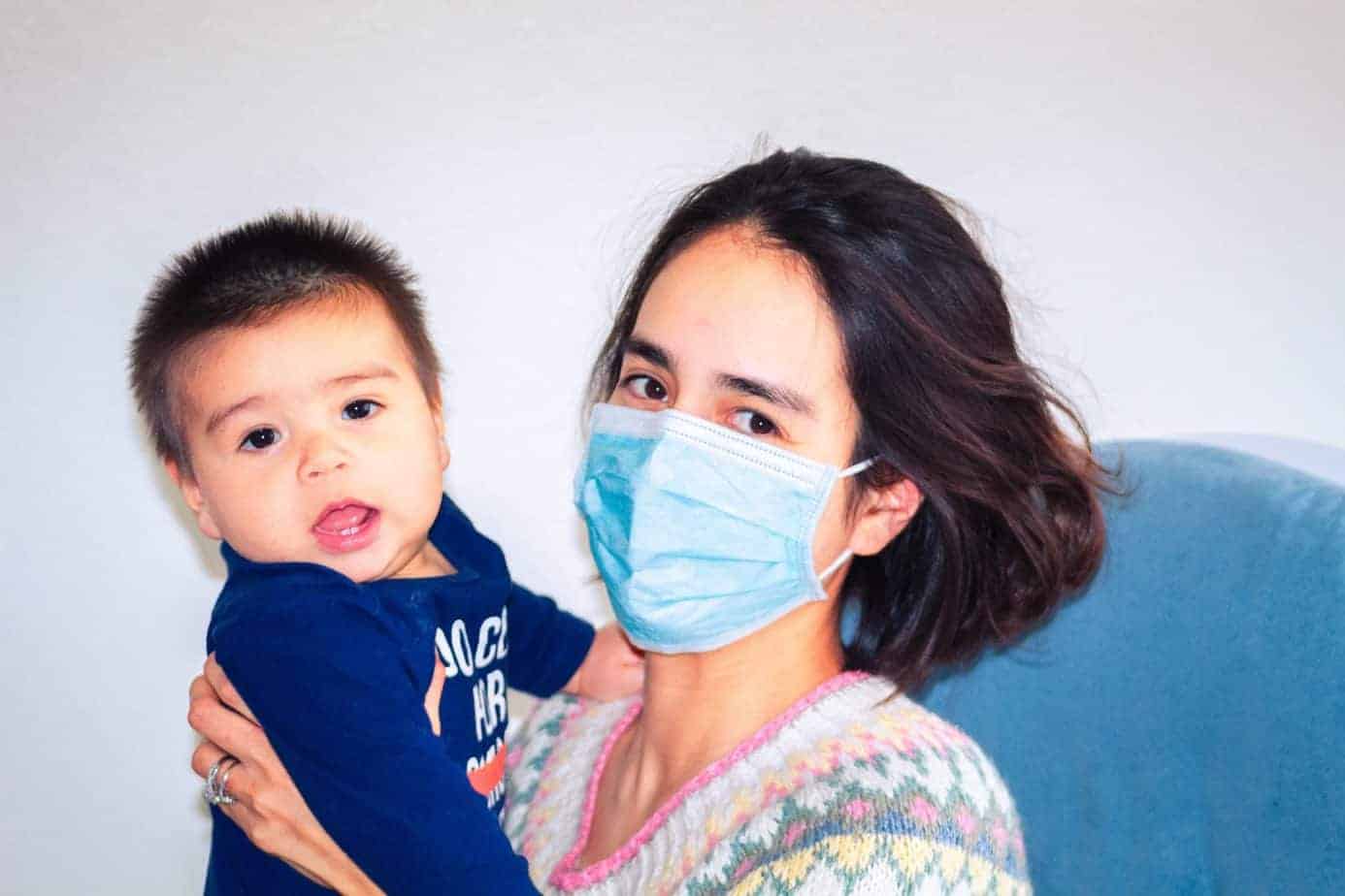 Mom with mask and baby