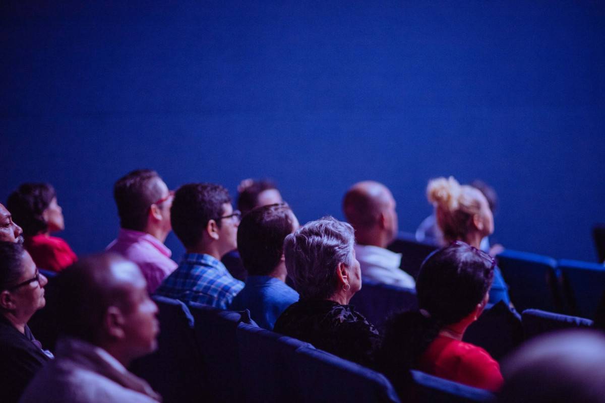 people sitting on gang chairs